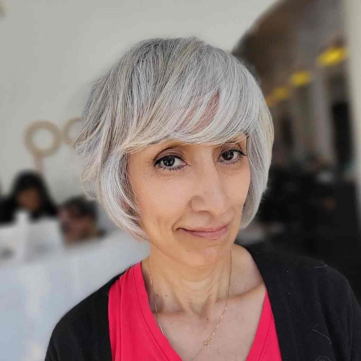 Gray Bob with Full Side Bangs for Women Over 50 with Fine Hair