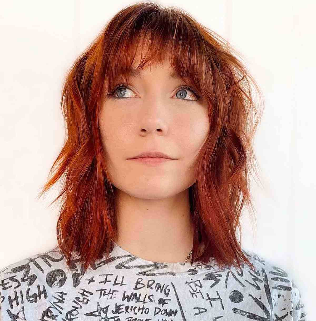 Long Shaggy Bob with Bangs and Messy Waves for Fine Hair