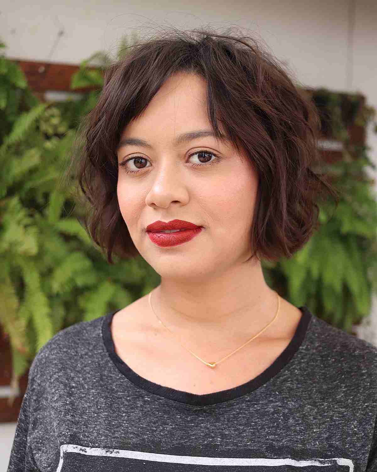 Short Textured Wavy Bob with Side Part and Bangs