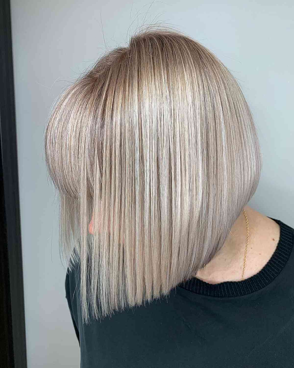 Straight Bob with Full Bangs for a 50 Year Old Woman with Fine Hair