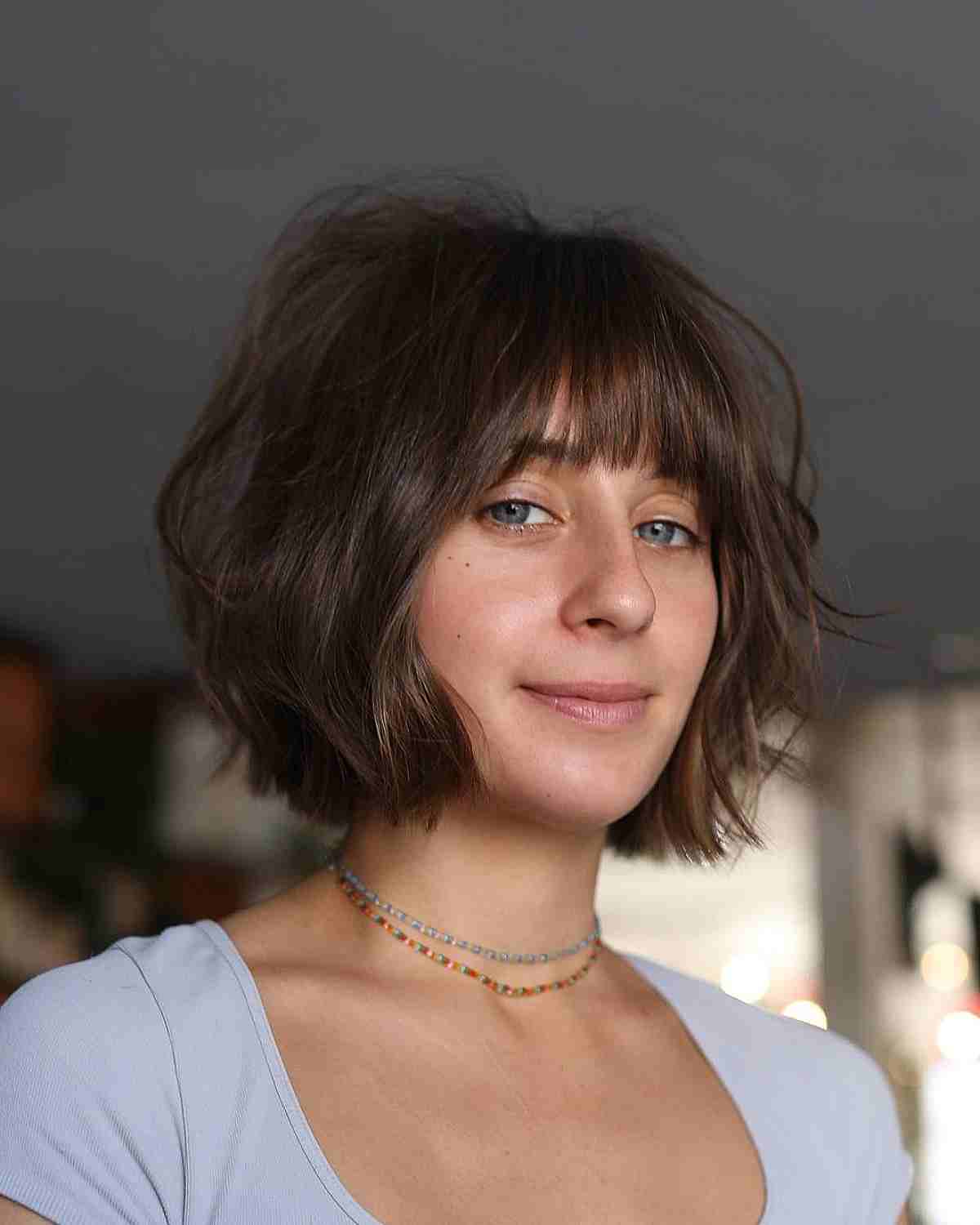 Wavy Blunt Bob with Light Bangs for Fine Hair