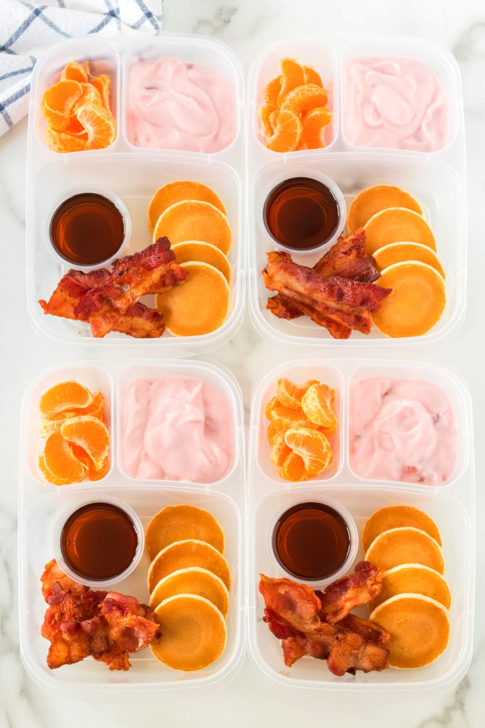 This easy breakfast lunch box idea is a favorite with kids. Packed with all your favorite breakfast foods. via @familyfresh