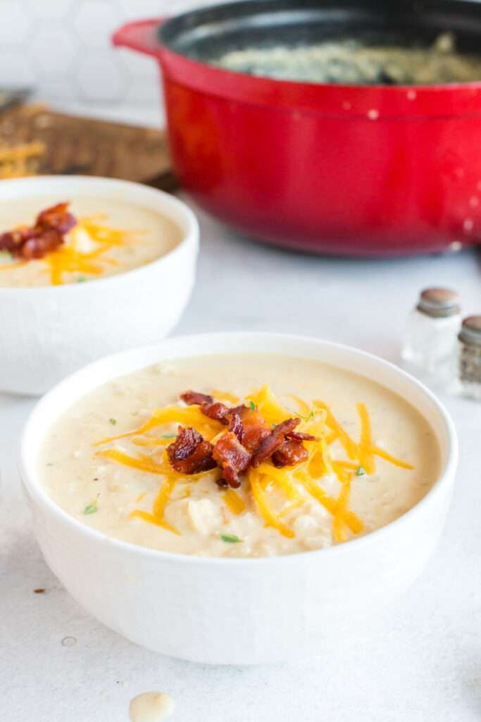 Cauliflower Cheesy Soup in two bowls