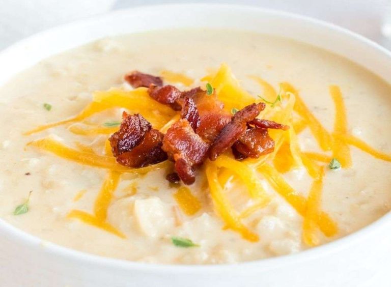 You can make Low Carb Cauliflower Cheese Soup even more delicious by serving it topped with bacon, shredded cheese, and fresh thyme.  via @familyfresh
