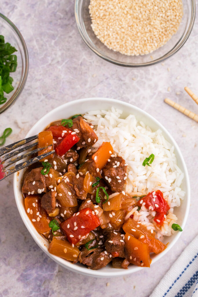Sweet and sour crockpot served over rice