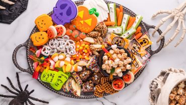 This fun Halloween snack board for kids is so fun and easy to create that kids could literally put it together for their friends.  via @familyfresh