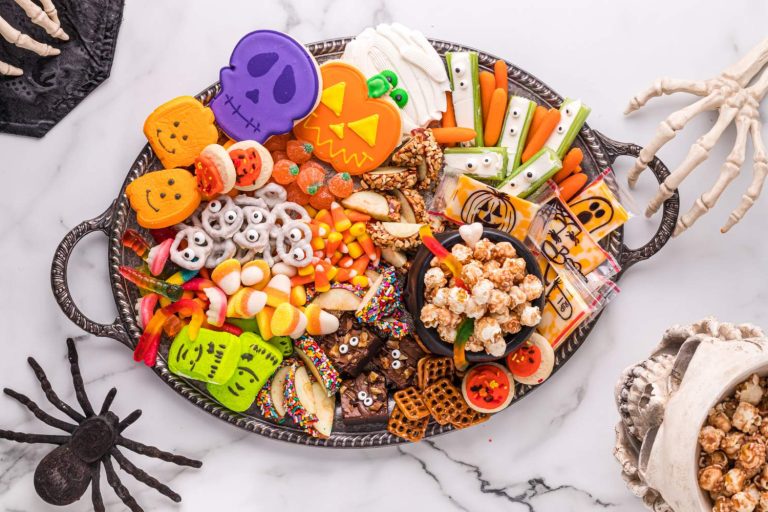This fun Halloween snack board for kids is so fun and easy to create that kids could literally put it together for their friends.  via @familyfresh