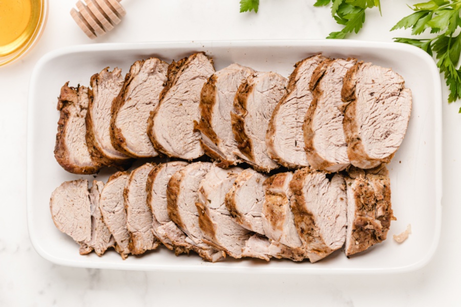 sliced ​​pork on a serving plate