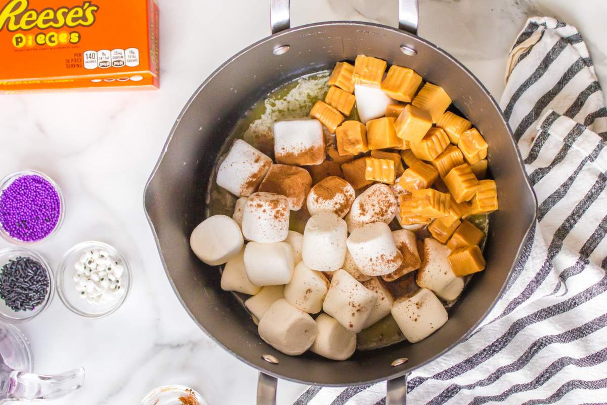 marshmallows, butter and caramels in a pot
