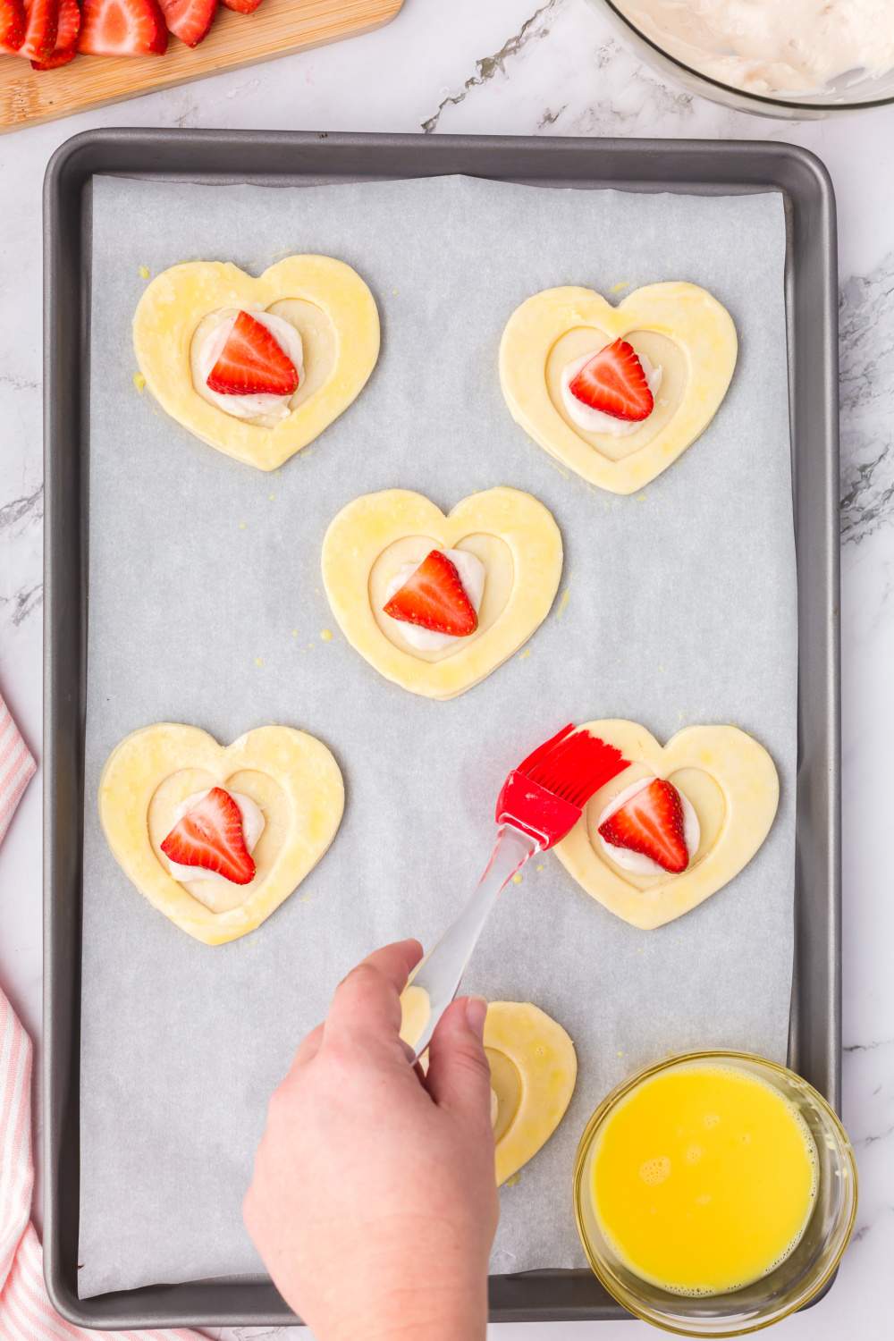 brushed pastry hearts edges