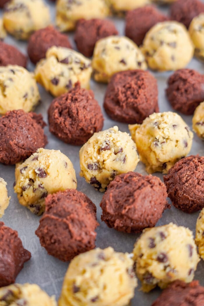 brownie batter and chocolate chip cookie dough dough rolled into balls