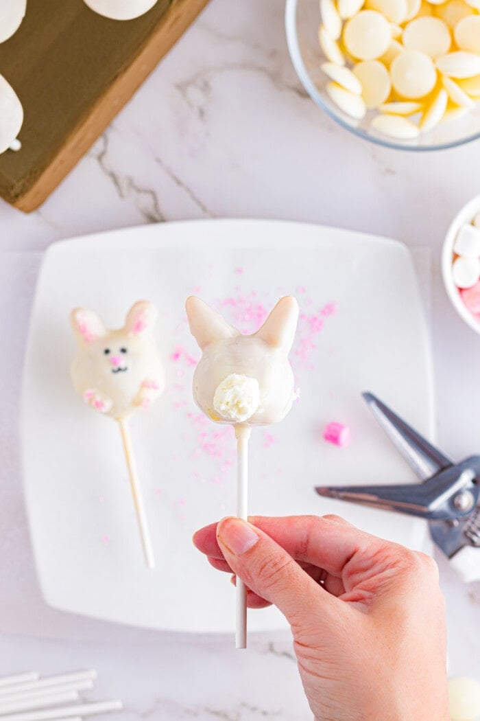 Adding the tail to the Easter Cake Pops.