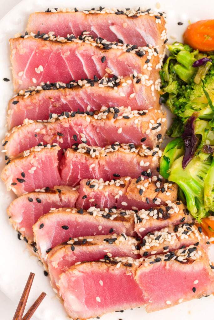 grilled ahi tuna steaks sliced ​​on a plate