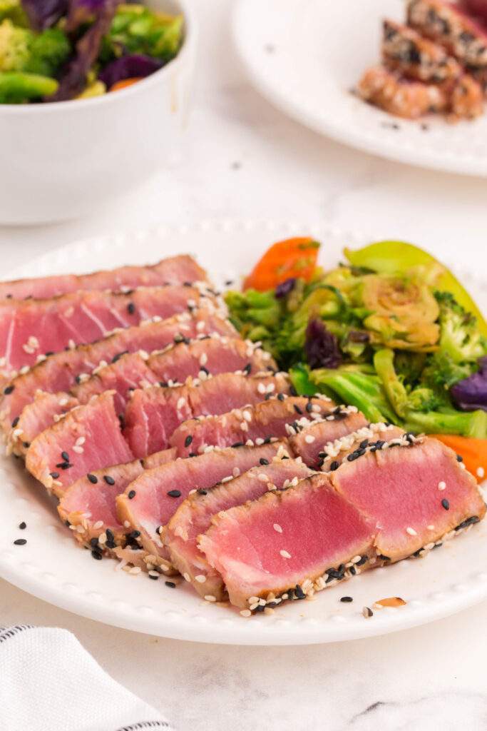 grilled ahi tuna steaks sliced ​​on a plate