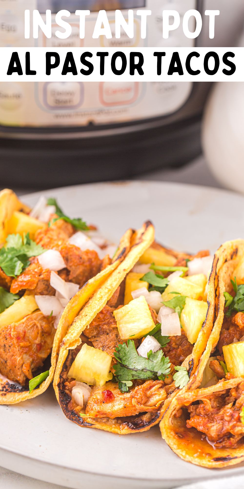 This Instant Pot Al Pastor Tacos recipe combines marinated pork with traditional Mexican spices and cooks to perfection in the Instant Pot. via @familyfresh