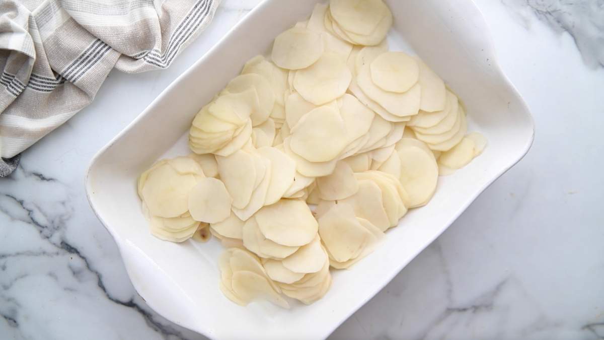 sliced ​​potatoes in a baking dish
