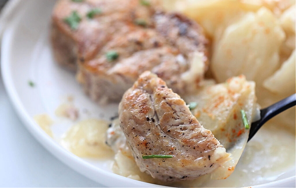 Pork Chops and Potato Gratin Casserole on a Plate