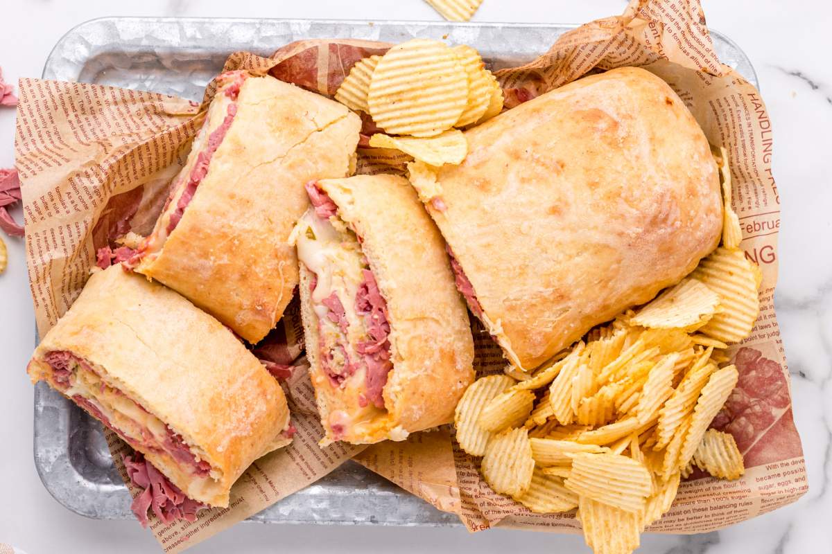 Reuben Garbage Bread on a plate with French fries