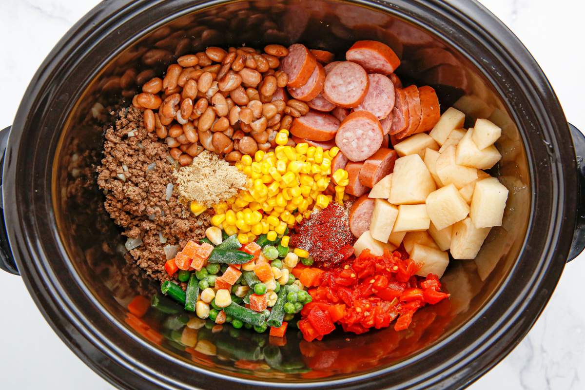 Crockpot Texas Cowboy Stew ingredients in a slow cooker