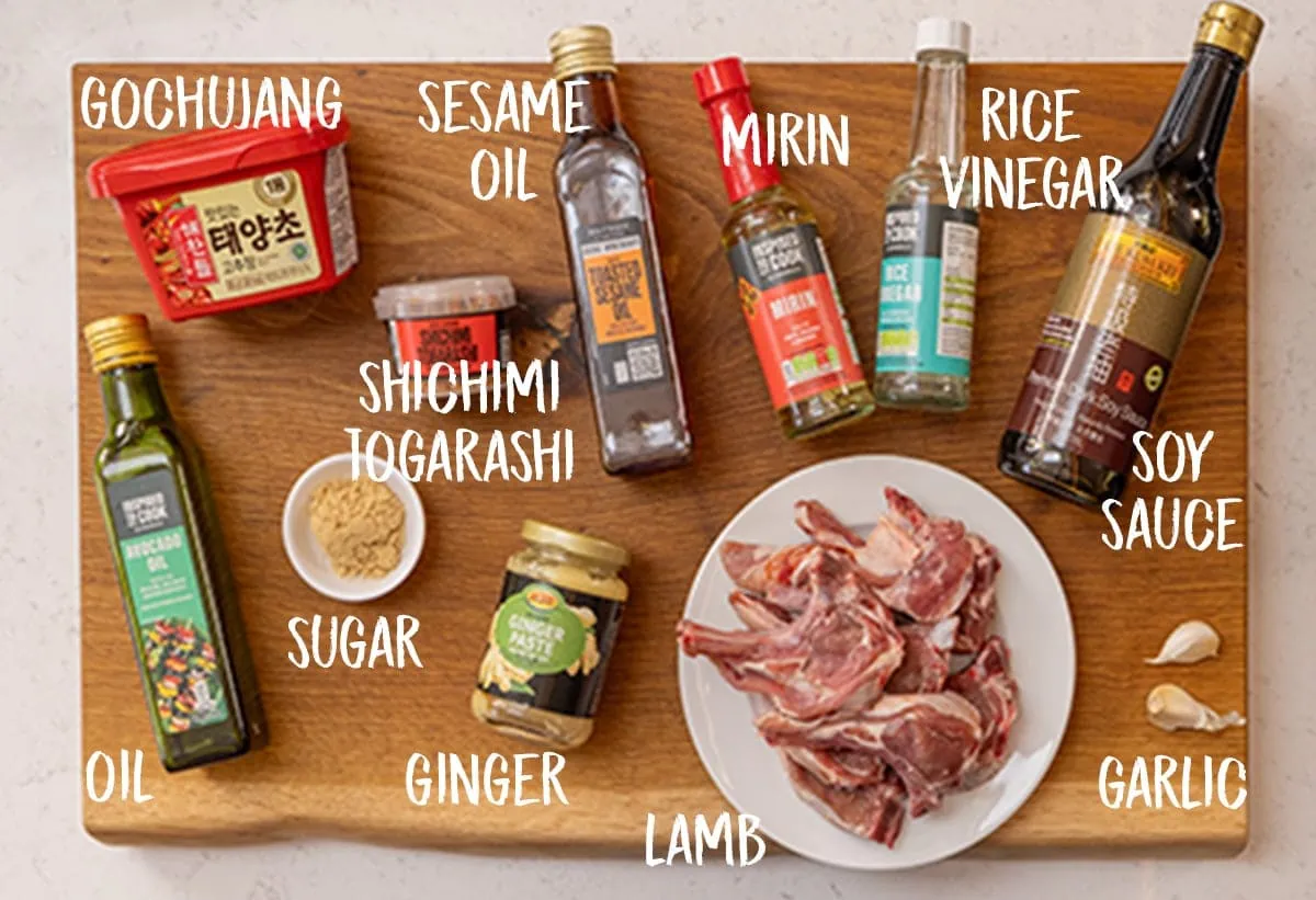 Ingredients for Korean-style lamb chops on a wooden board.