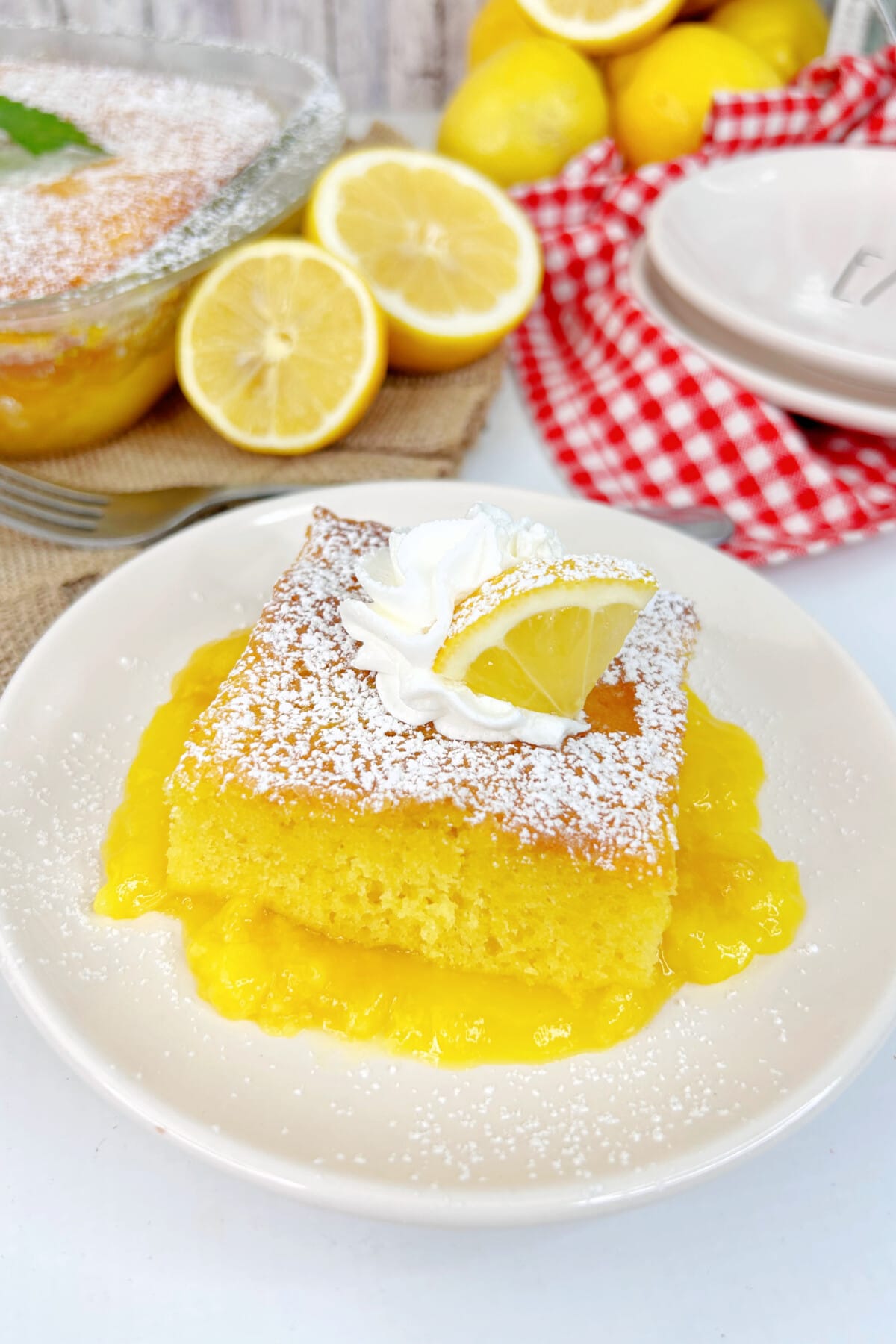 lemon pudding cake on a white plate