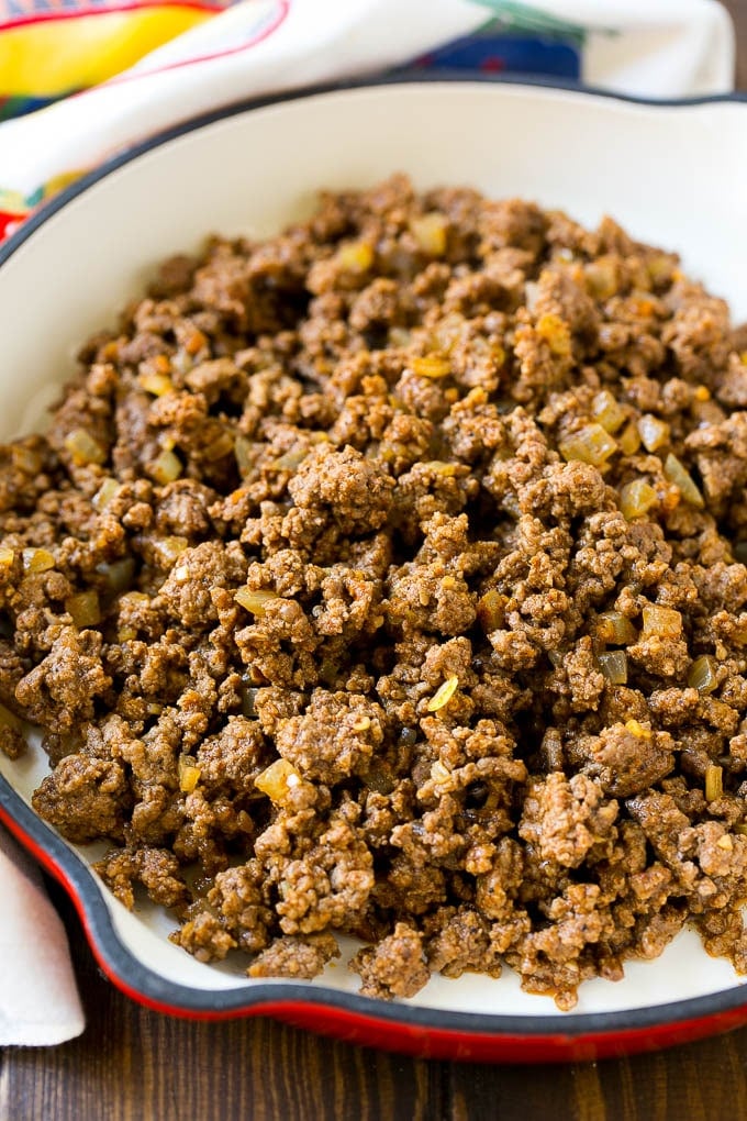 A pan of taco seasoned ground beef and onions.