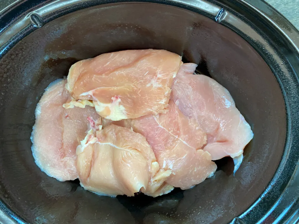 Chicken cutlets in a slow cooker.