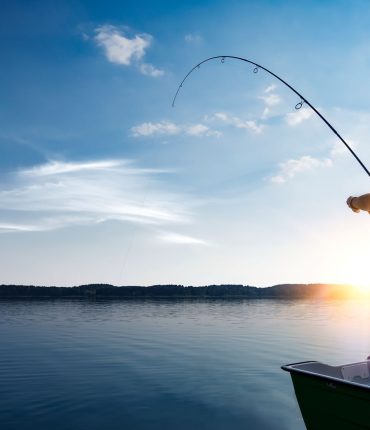 A man inquires about the secret behind a young boy’s exceptional fishing skills