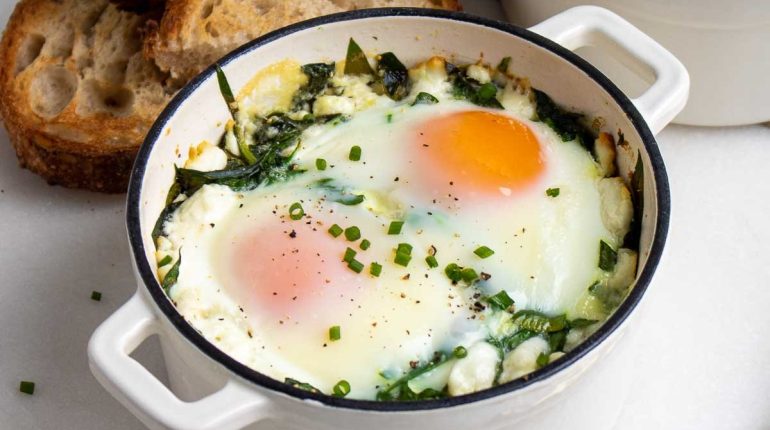 Breakfast brunch Creamy Spinach Baked Eggs dietary adaptations Easy Eggs fiber Gluten-Free goat cheese Healthy Fats heavy cream higher fiber higher protein lower fat nutrition protein Quick Recipe reheating Spinach weight loss. 