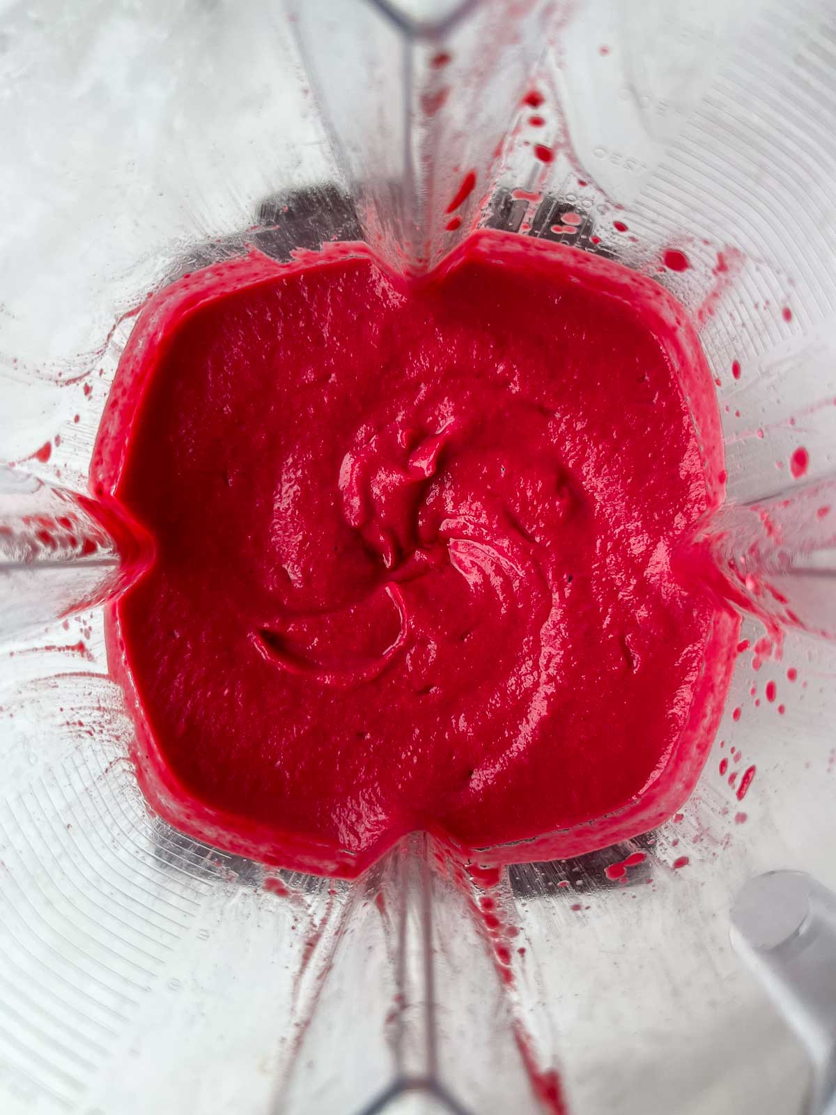 Creamy beet pasta sauce in a blender.