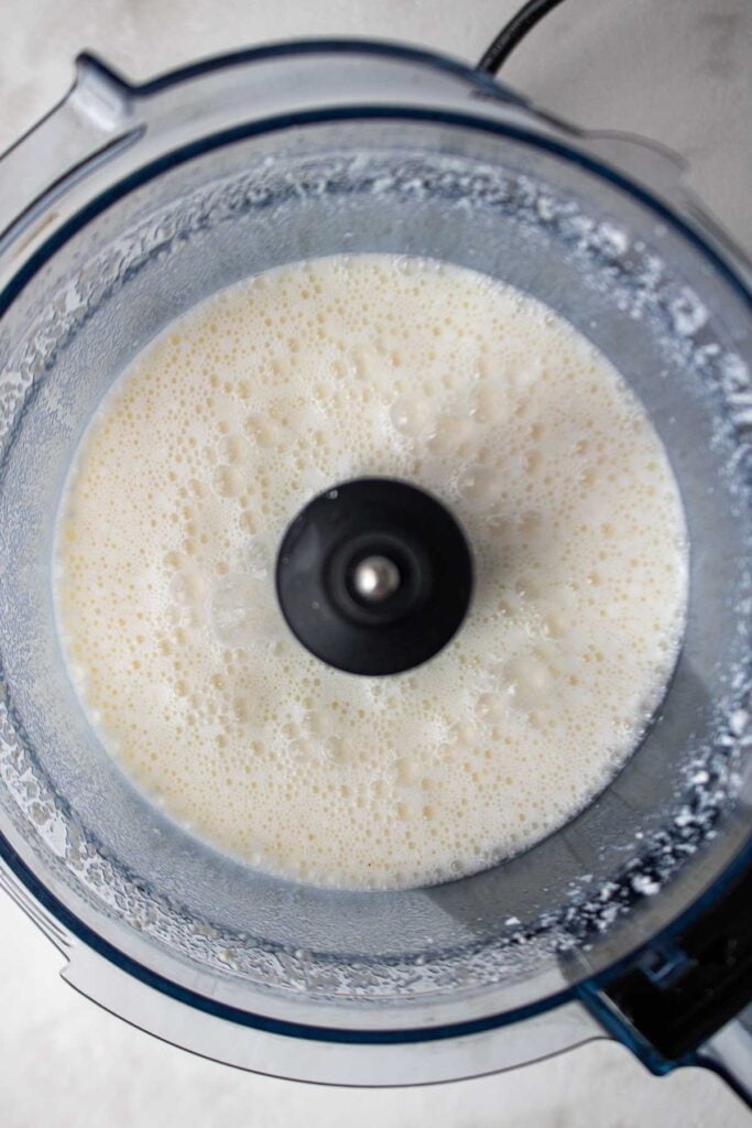 Blended egg white bite mixture in a food processor.