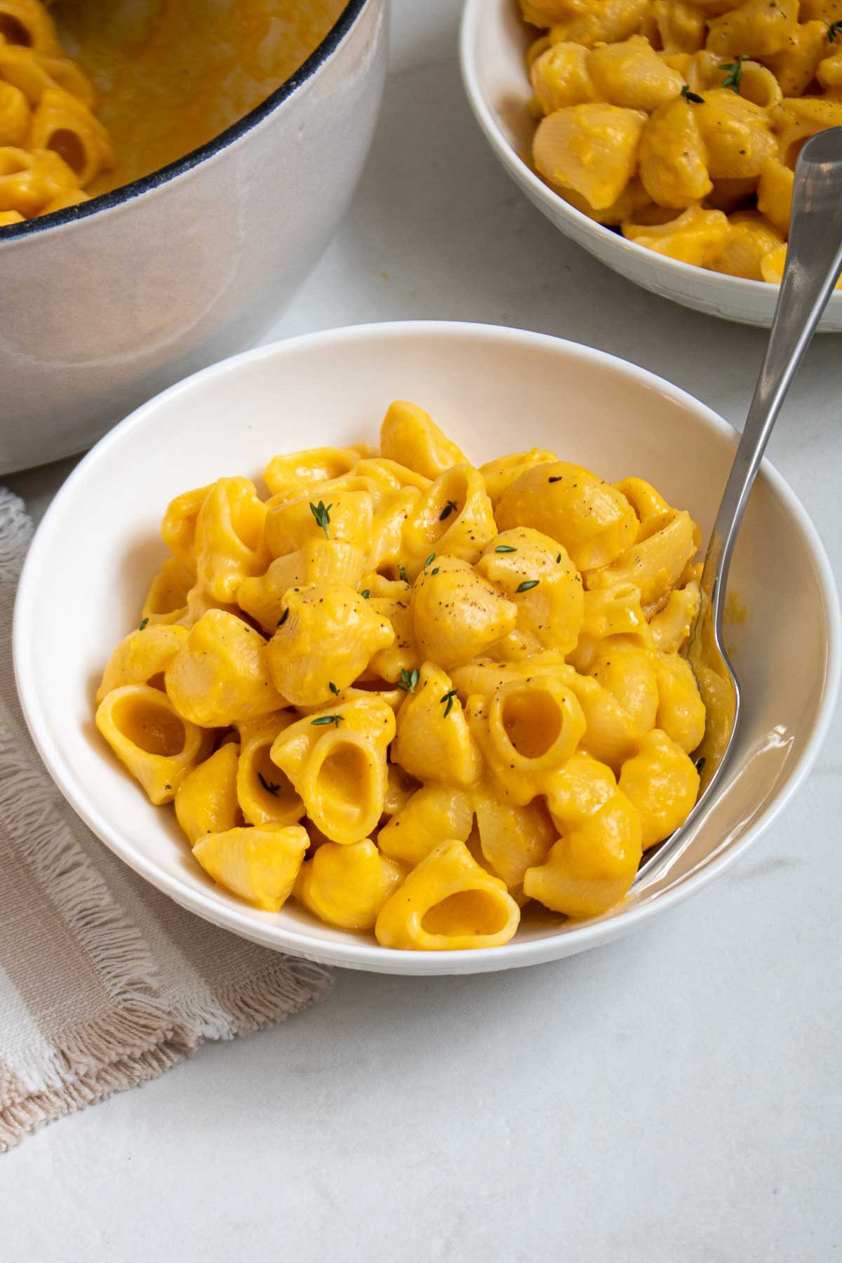 Healthy mac and cheese with butternut squash in a bowl