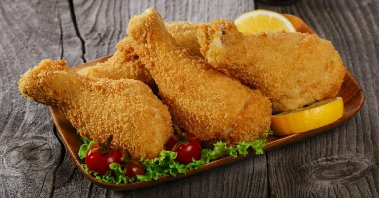 Homemade-Breaded-Fried-Chicken-Legs-with-Lemon-Tomatoes-and-Lettuce-1024×536