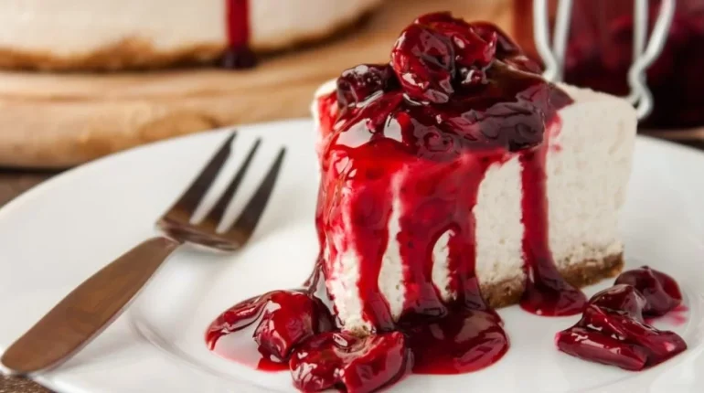 cherry pie filling Cream cream cheese crowd-pleaser. dessert freezing Graham Cracker Crust ingredients Lemon Juice no-bake cherry cheesecake party Recipe storage sweetened condensed milk tips vanilla extract 