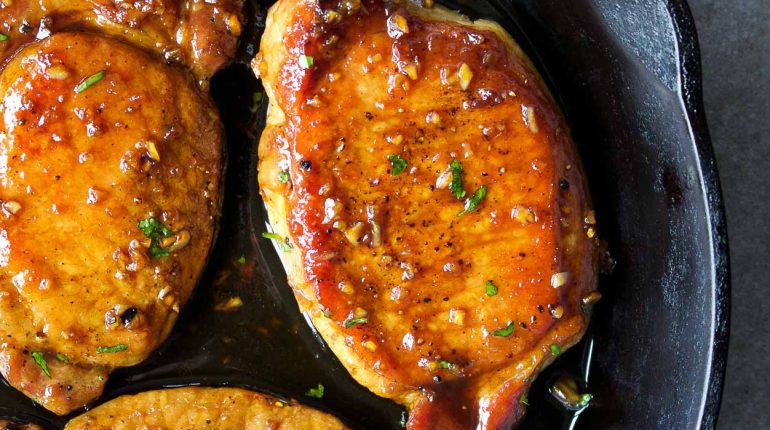 boneless pork chops easy recipe Family Meal Homemade honey garlic Pork chop recipe protein-packed quick dinner savory sauce. sweet and sticky weeknight meal 