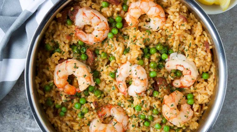 Arborio rice aromatic spices chorizo sausage fragrant spices Gluten-Free Instructions nutrition paella history protein-packed Quick and Easy Recipe Shrimp paella Spanish cuisine Spanish flavors Spanish-inspired traditional dish weeknight meal 