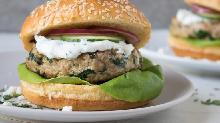Cooking Dinner Easy Flavorful Greek flavors Grill healthy high protein Homemade ingredients Lunch Recipe Spinach Feta Turkey Burgers toppings turkey patties yogurt sauce 