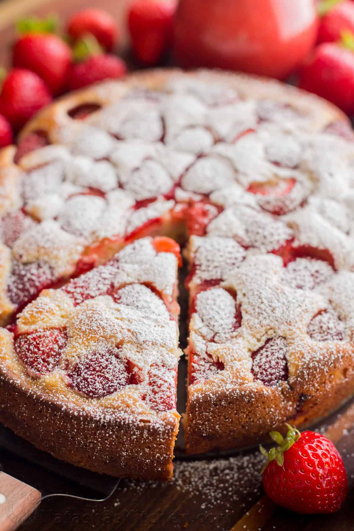 Strawberry cake dusted with powdered sugar