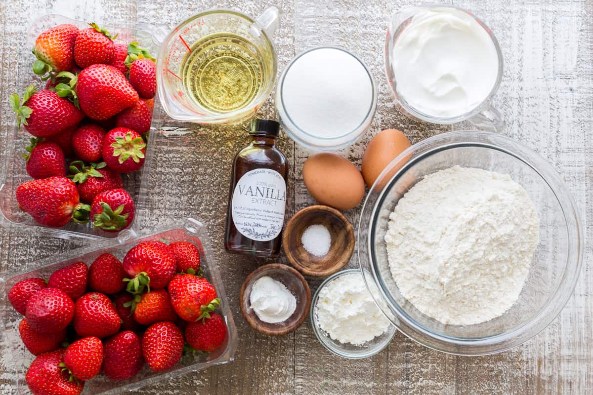 Ingredients for cake with fresh strawberries