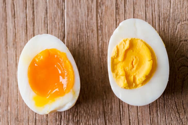 Perfectly cooked soft boiled egg and perfectly cooked hard boiled egg