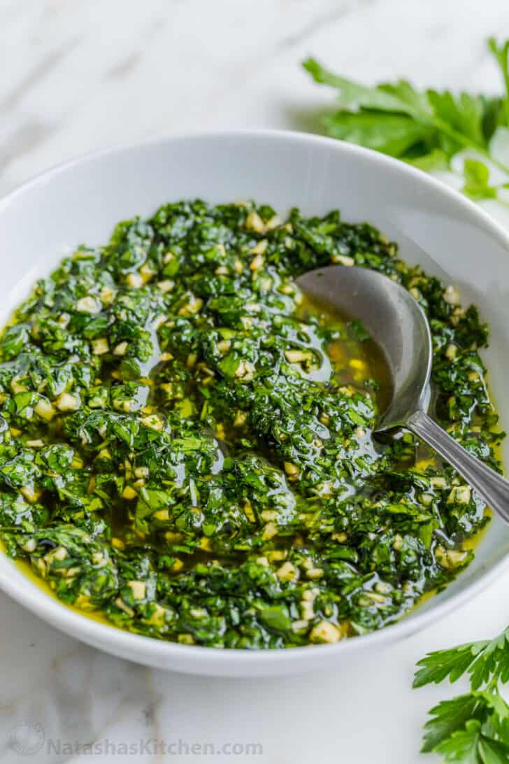 Argentinian Chimichurri in a bowl with a spoon