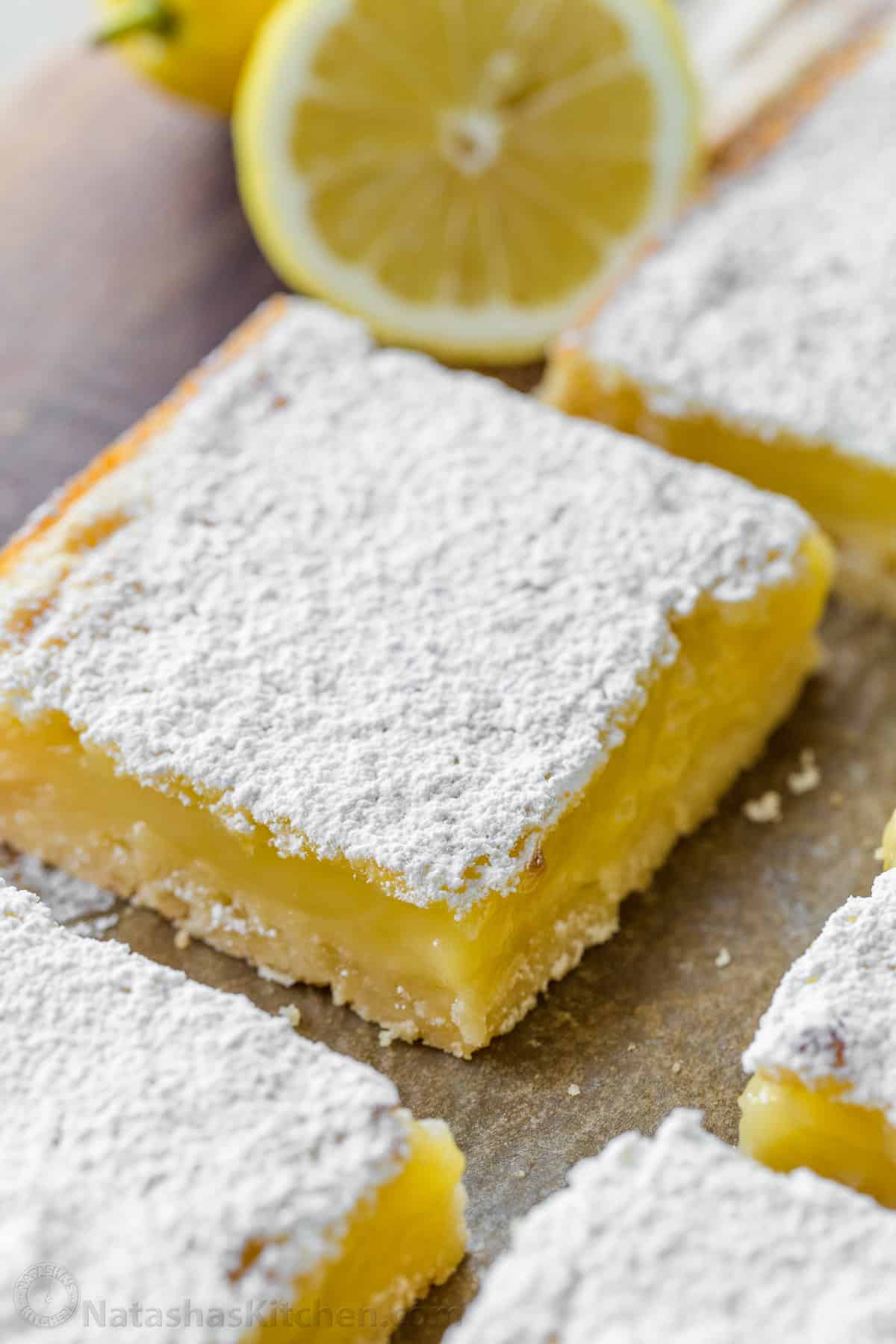 Up close lemon bar with lemon custard filling