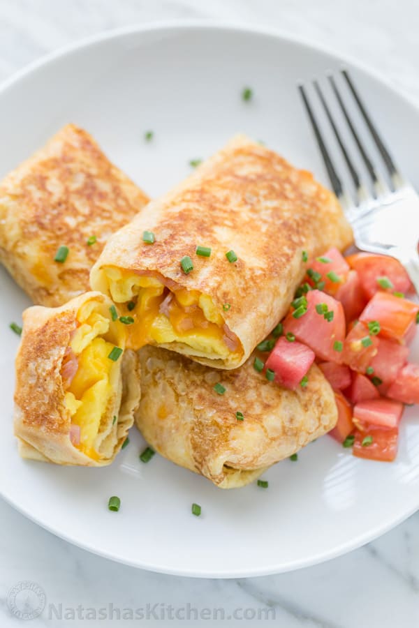 Egg, Ham and Cheese Crepes Pockets - Our son's favorite breakfast and they are freezer friendly! | natashaskitchen.com