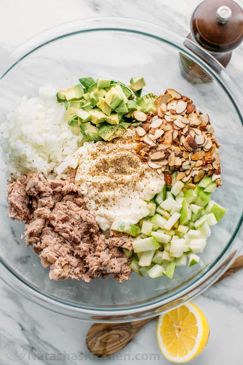 Fresh tuna salad with apple recipe ingredients in a bowl before mixing