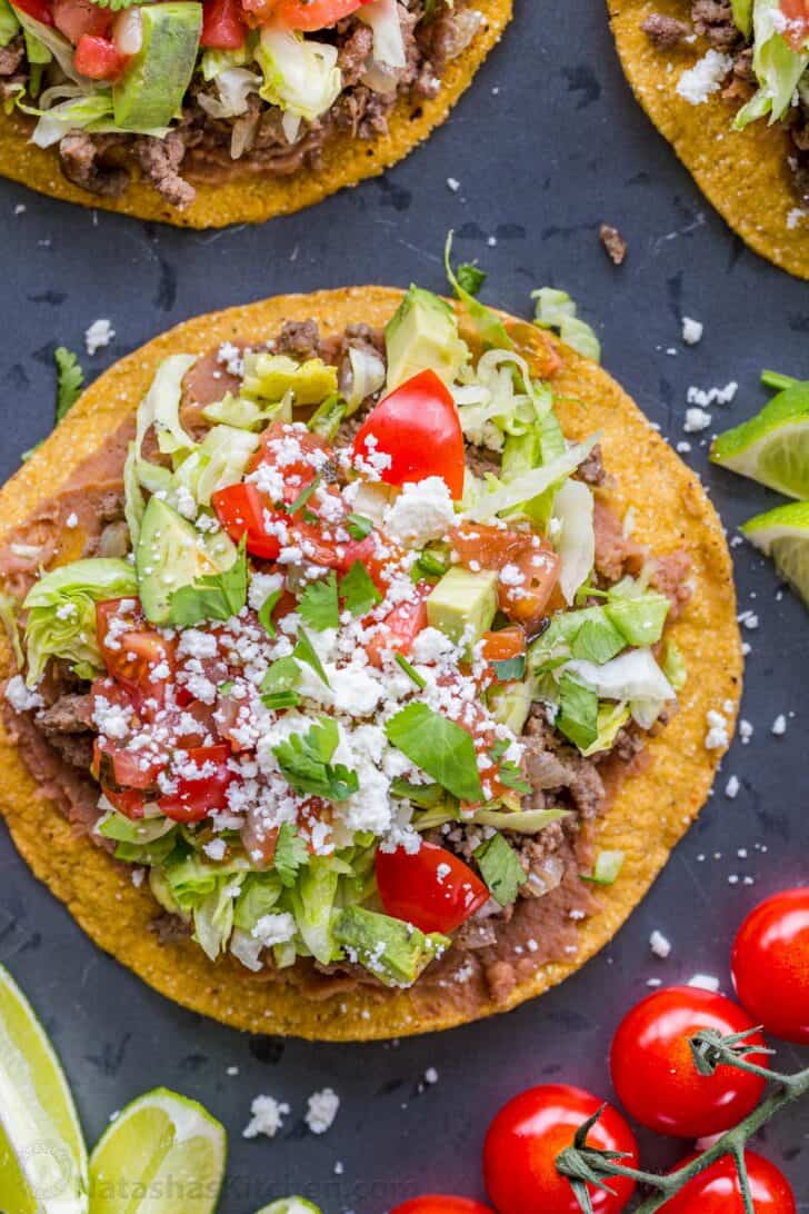 Up close crunchy tostada with toppings