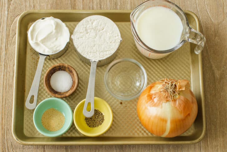 Overhead view of ingredients for onion ring recipe