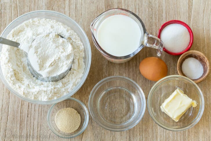 Ingredients for making cloverleaf rolls with milk bread dough