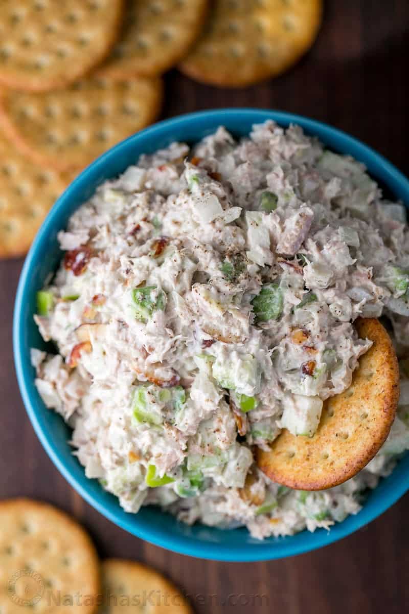 Tuna salad with apples and avocado served with crackers