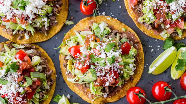 Homemade Tostadas Mexican cuisine Taco Tortilla Tostada assembly Tostada difference Tostada recipe Tostada shells Tostada toppings Tostada variations Vegetarian Tostadas. 